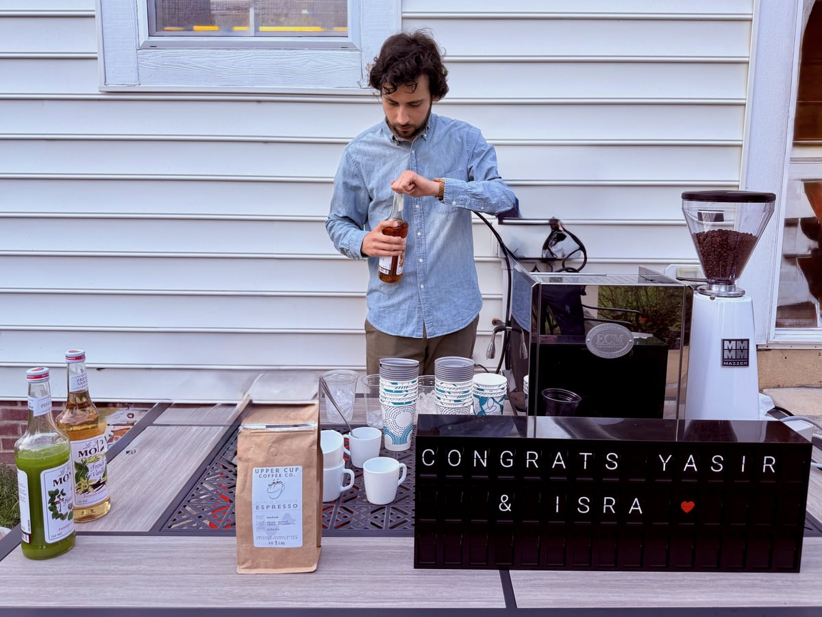 Vestaboard display beside the coffee setup